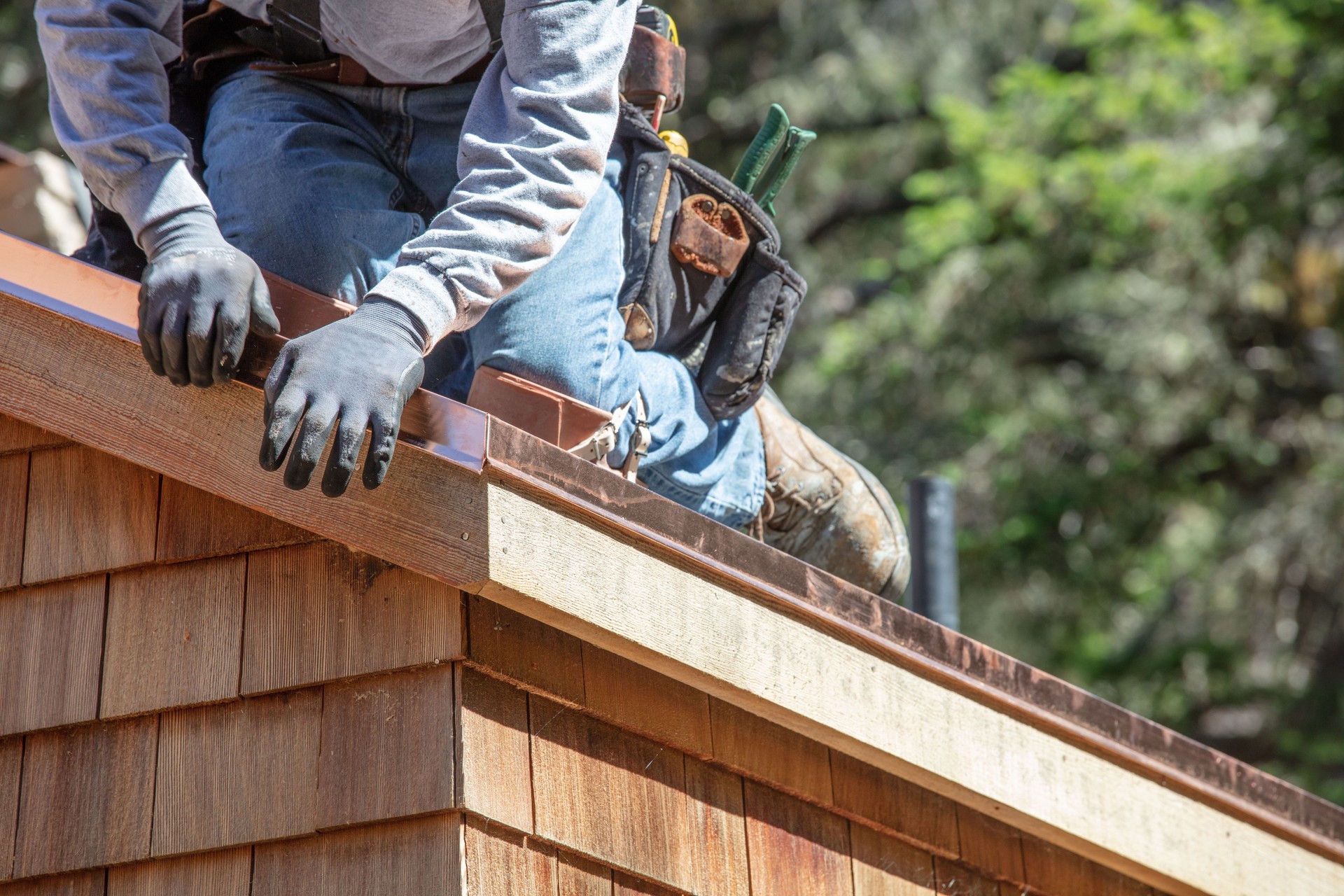 Installing new roof with copper flashing