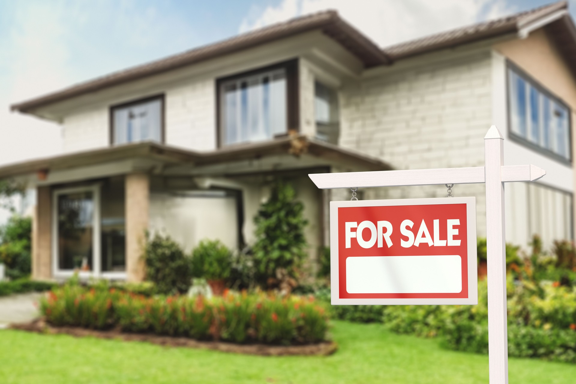 Real Estate Sign in Front of a House with a Garden for Sale