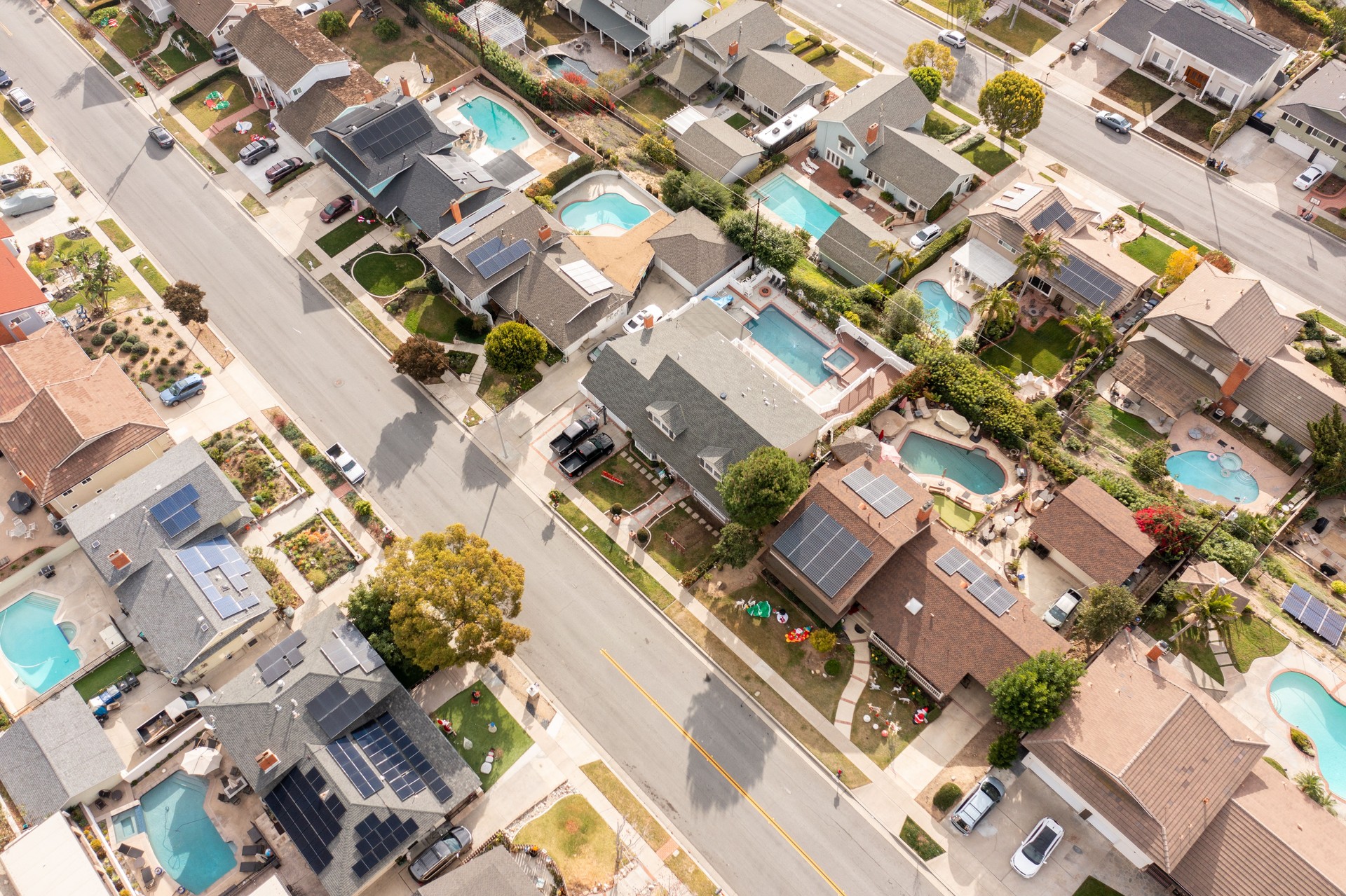 Aerial image of residential homes with solar panels