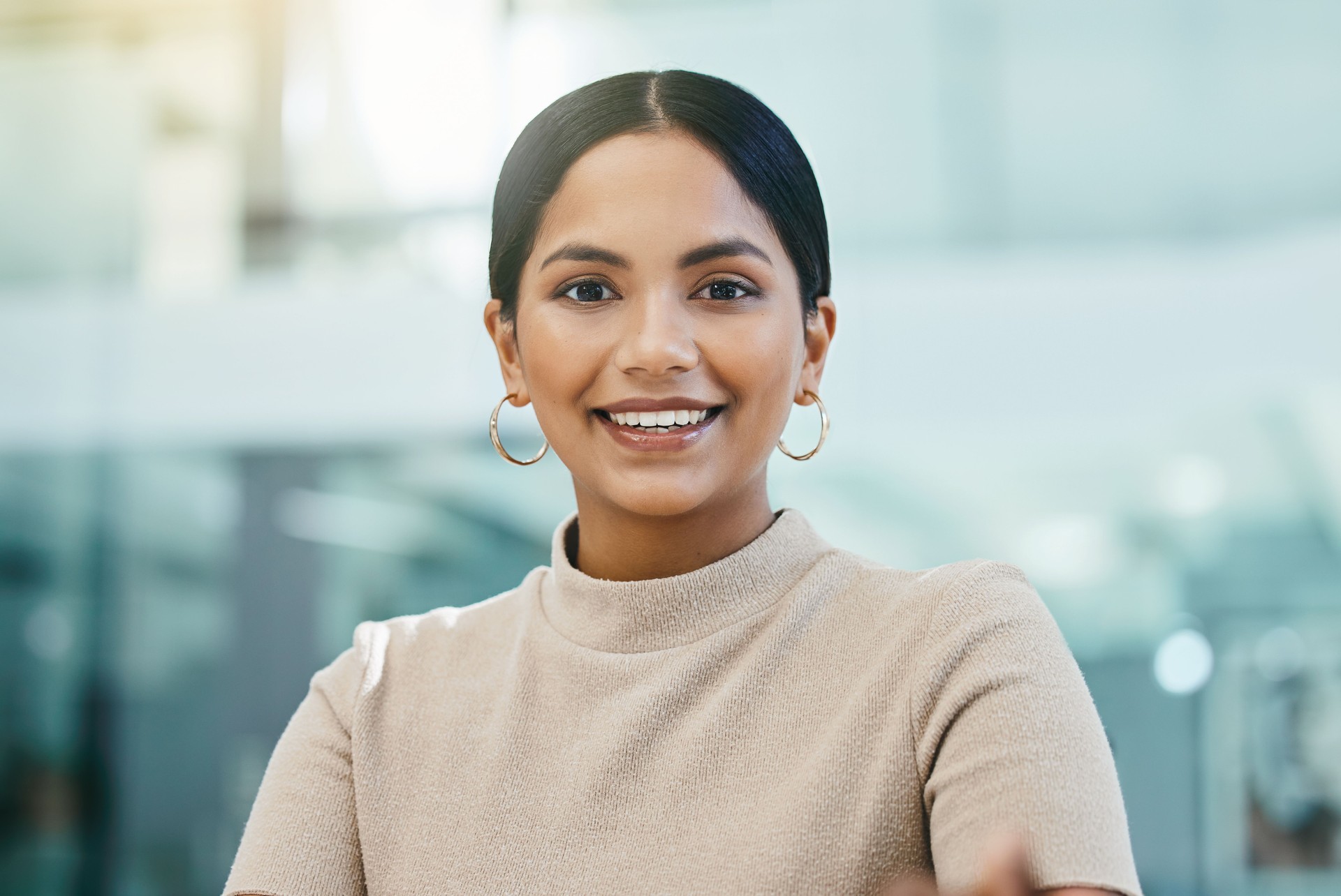 Shot of a young businesswoman in her office